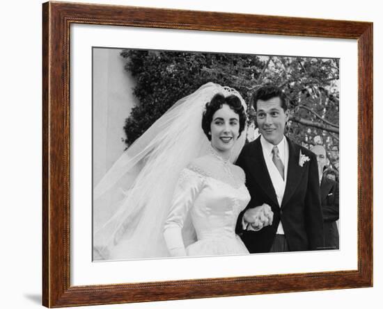 Elizabeth Taylor Wearing Beautiful Satin Wedding Gown with Husband Nicky Hilton Outside Church-Ed Clark-Framed Premium Photographic Print