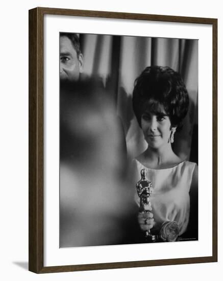 Elizabeth Taylor Winning an Oscar-Grey Villet-Framed Premium Photographic Print