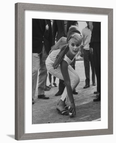 Elke Sommer Playing Petanque at the Cannes Film Festival-Paul Schutzer-Framed Premium Photographic Print