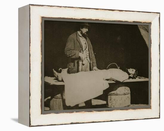 Embalming Surgeon at Work, 1861-65-Mathew Brady-Framed Premier Image Canvas