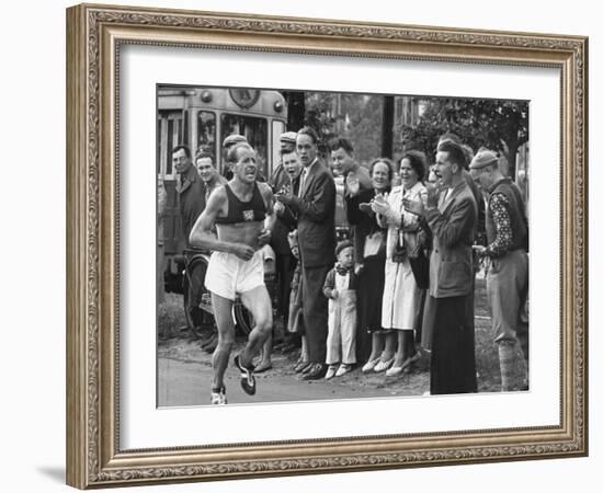 Emil Zatopek Leading in Marathon at 1952 Olympics-null-Framed Premium Photographic Print