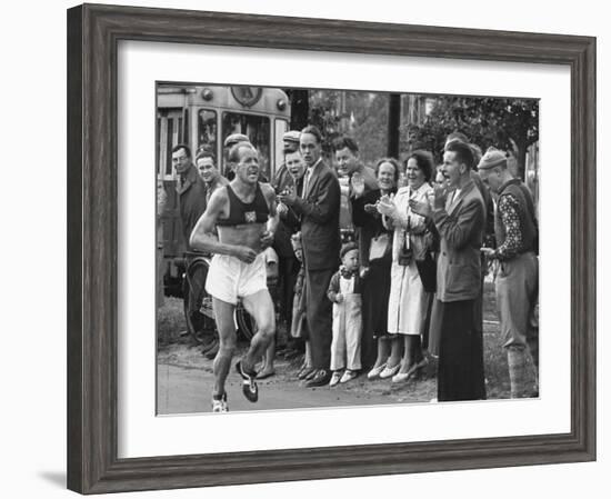 Emil Zatopek Leading in Marathon at 1952 Olympics-null-Framed Premium Photographic Print