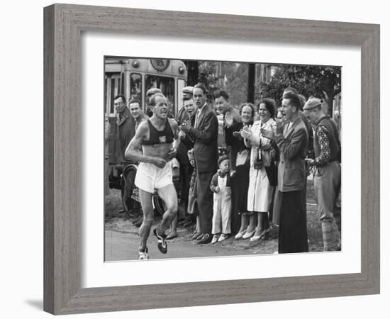 Emil Zatopek Leading in Marathon at 1952 Olympics-null-Framed Premium Photographic Print