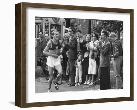 Emil Zatopek Leading in Marathon at 1952 Olympics-null-Framed Premium Photographic Print