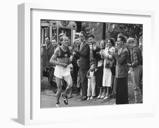 Emil Zatopek Leading in Marathon at 1952 Olympics-null-Framed Premium Photographic Print