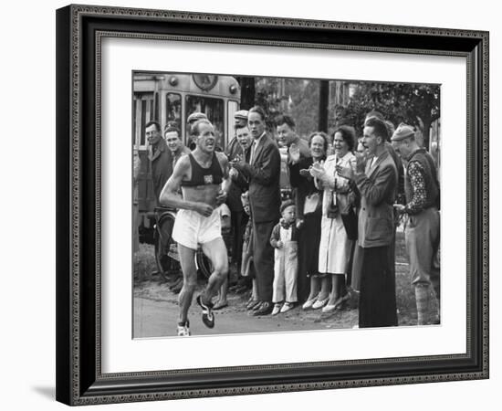 Emil Zatopek Leading in Marathon at 1952 Olympics-null-Framed Premium Photographic Print