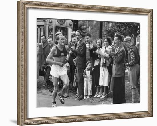 Emil Zatopek Leading in Marathon at 1952 Olympics-null-Framed Premium Photographic Print