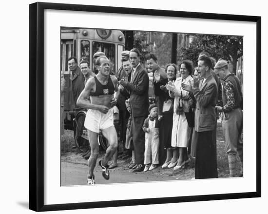 Emil Zatopek Leading in Marathon at 1952 Olympics-null-Framed Premium Photographic Print