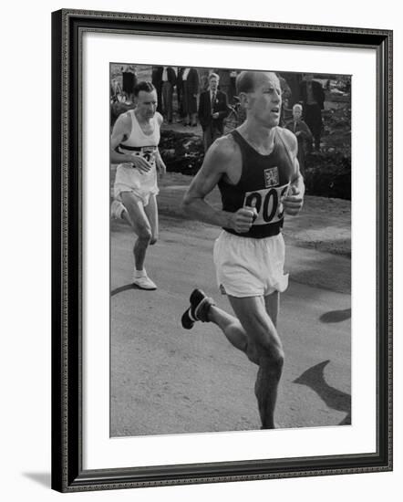 Emil Zatopek Running in Marathon at 1952 Olympics-null-Framed Premium Photographic Print