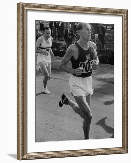 Emil Zatopek Running in Marathon at 1952 Olympics-null-Framed Premium Photographic Print