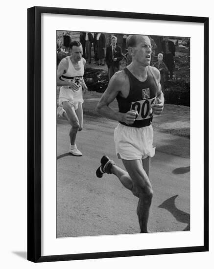 Emil Zatopek Running in Marathon at 1952 Olympics-null-Framed Premium Photographic Print