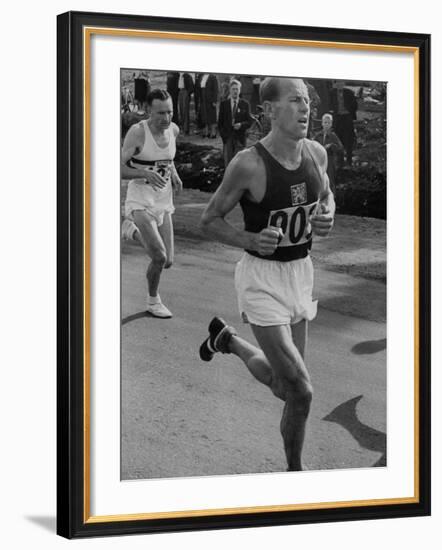 Emil Zatopek Running in Marathon at 1952 Olympics-null-Framed Premium Photographic Print