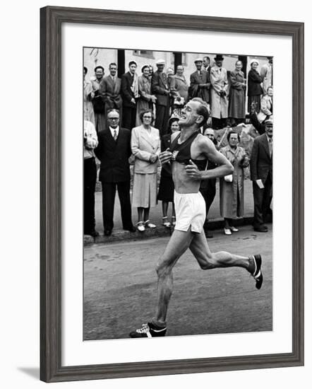 Emil Zatopek Running in Marathon at 1952 Olympics-null-Framed Premium Photographic Print