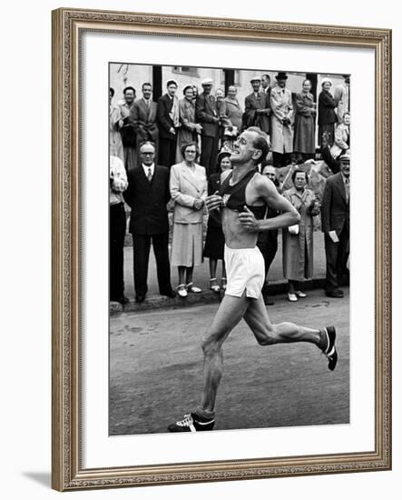 Emil Zatopek Running in Marathon at 1952 Olympics-null-Framed Premium Photographic Print