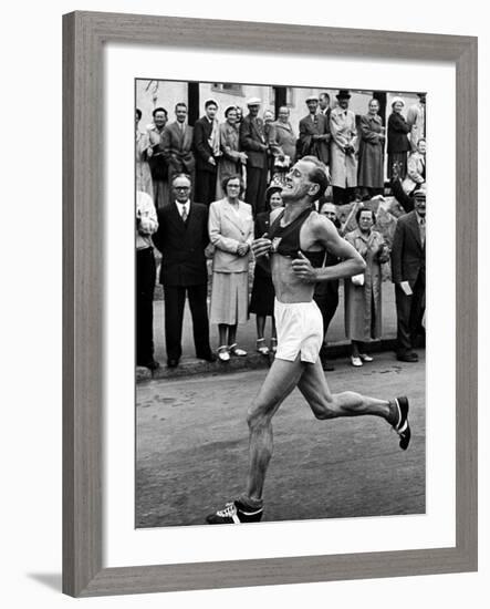 Emil Zatopek Running in Marathon at 1952 Olympics-null-Framed Premium Photographic Print