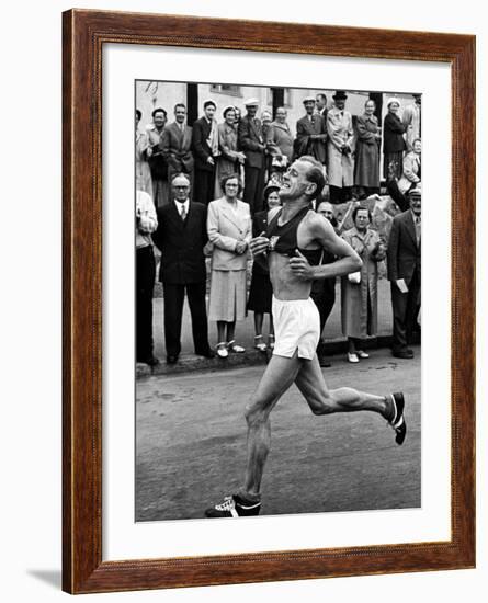 Emil Zatopek Running in Marathon at 1952 Olympics-null-Framed Premium Photographic Print