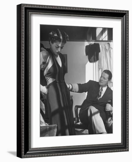 Emmet Joyce of Saks Examining His Design of This Dress of French Silk, WWII-Alfred Eisenstaedt-Framed Photographic Print