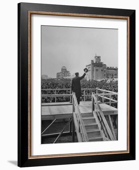 Emperor Hirohito Standing on Platform and Waving to the Crowd-Carl Mydans-Framed Photographic Print