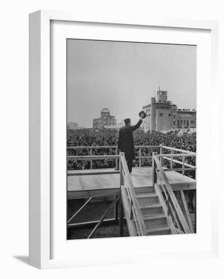 Emperor Hirohito Standing on Platform and Waving to the Crowd-Carl Mydans-Framed Photographic Print