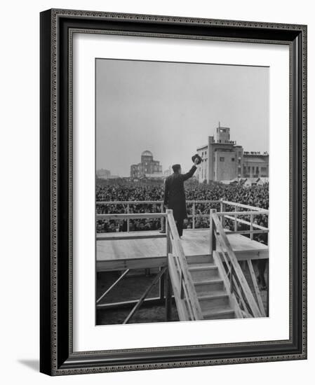 Emperor Hirohito Standing on Platform and Waving to the Crowd-Carl Mydans-Framed Photographic Print