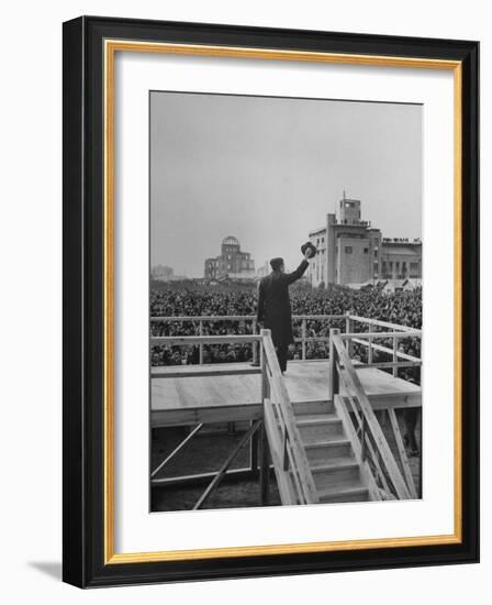 Emperor Hirohito Standing on Platform and Waving to the Crowd-Carl Mydans-Framed Photographic Print