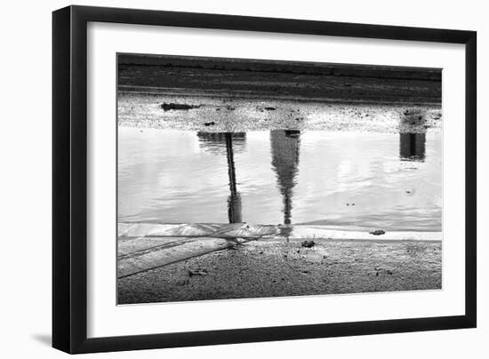 Empire State Building Reflection in Puddle-null-Framed Photo