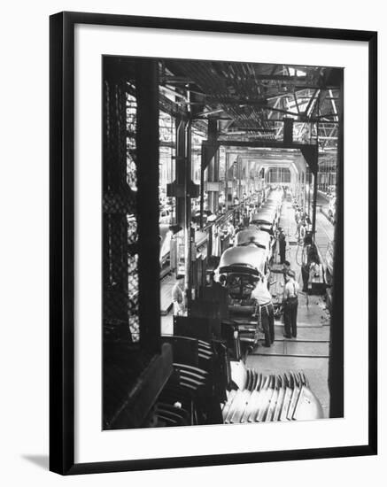 Employees Working on Cars as They Move Down Assembly Line-Ralph Morse-Framed Premium Photographic Print