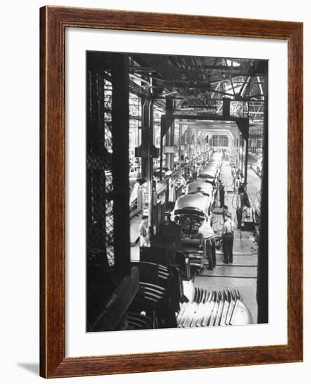 Employees Working on Cars as They Move Down Assembly Line-Ralph Morse-Framed Premium Photographic Print