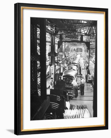 Employees Working on Cars as They Move Down Assembly Line-Ralph Morse-Framed Premium Photographic Print