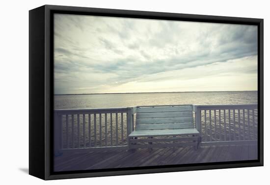 Empty Bench along the Boardwalk Overlooking the Currituck Sound in Duck in the Outer Banks of North-pdb1-Framed Premier Image Canvas