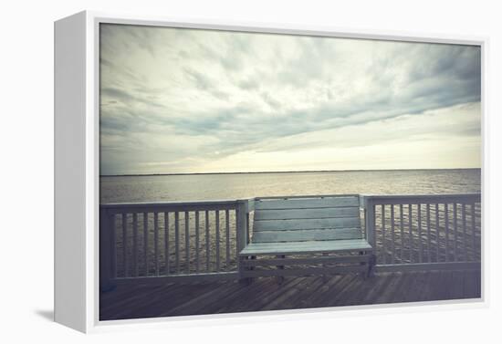 Empty Bench along the Boardwalk Overlooking the Currituck Sound in Duck in the Outer Banks of North-pdb1-Framed Premier Image Canvas