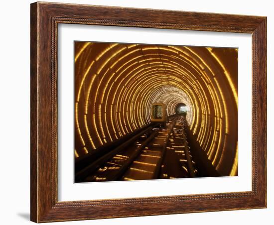 Empty Tourist Subway Car Runs Through Illuminated Tunnel in Shanghai, China-null-Framed Photographic Print