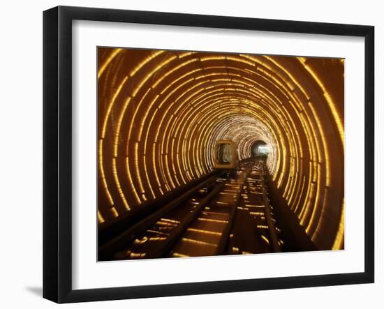 Empty Tourist Subway Car Runs Through Illuminated Tunnel in Shanghai, China-null-Framed Photographic Print