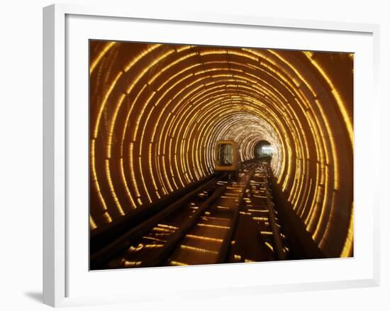 Empty Tourist Subway Car Runs Through Illuminated Tunnel in Shanghai, China-null-Framed Photographic Print