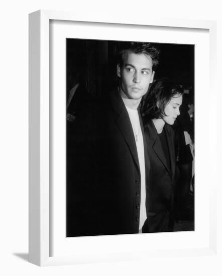 Engaged Actors Johnny Depp and Winona Ryder Attending Premier of the Film "Pacific Heights"-null-Framed Premium Photographic Print