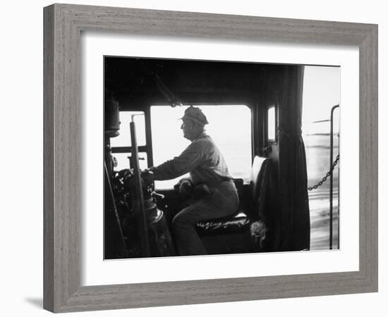 Engineer Aboard the 20th Century Limited Riding in Cab with His Hand on the Engine Brake-Alfred Eisenstaedt-Framed Photographic Print