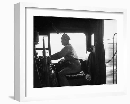 Engineer Aboard the 20th Century Limited Riding in Cab with His Hand on the Engine Brake-Alfred Eisenstaedt-Framed Photographic Print
