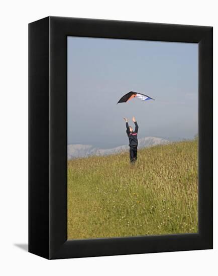 England, Isle of Wight; Boy Flying a Kite on the Downs Near Compton Bay in Southwest of the Island-Will Gray-Framed Premier Image Canvas