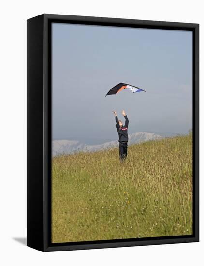 England, Isle of Wight; Boy Flying a Kite on the Downs Near Compton Bay in Southwest of the Island-Will Gray-Framed Premier Image Canvas