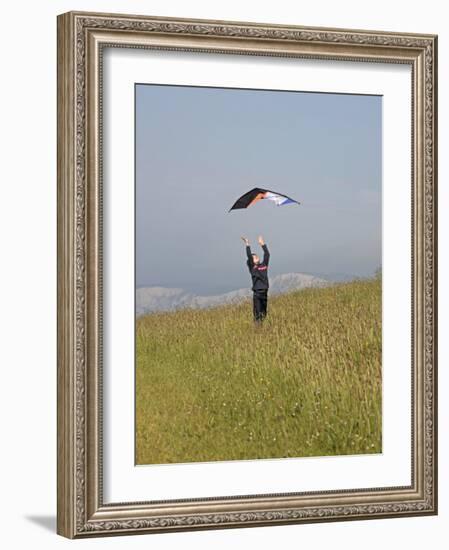 England, Isle of Wight; Boy Flying a Kite on the Downs Near Compton Bay in Southwest of the Island-Will Gray-Framed Photographic Print