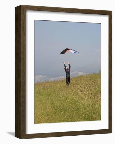 England, Isle of Wight; Boy Flying a Kite on the Downs Near Compton Bay in Southwest of the Island-Will Gray-Framed Photographic Print