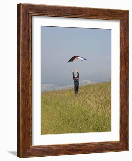 England, Isle of Wight; Boy Flying a Kite on the Downs Near Compton Bay in Southwest of the Island-Will Gray-Framed Photographic Print