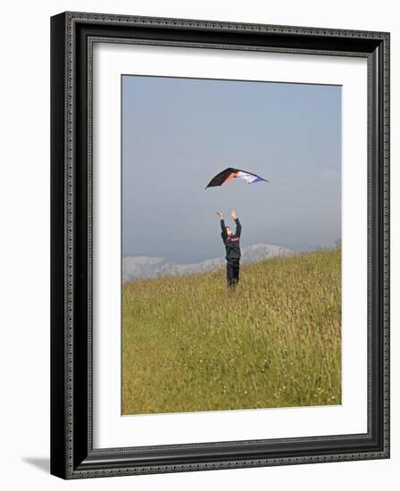 England, Isle of Wight; Boy Flying a Kite on the Downs Near Compton Bay in Southwest of the Island-Will Gray-Framed Photographic Print