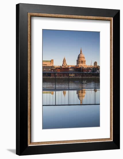 England, London, Person Reflected in Puddle at Dawn-Walter Bibikow-Framed Photographic Print