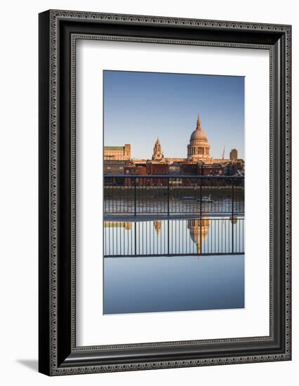 England, London, Person Reflected in Puddle at Dawn-Walter Bibikow-Framed Photographic Print