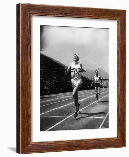 England's Dr. Roger Bannister Beating Australia's Mile Record Holder John Landy-Ralph Morse-Framed Premium Photographic Print