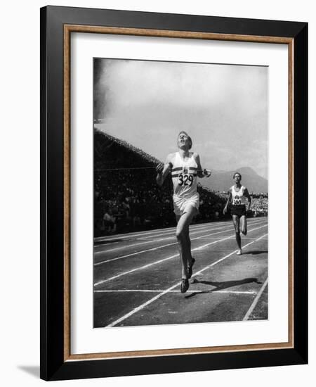 England's Dr. Roger Bannister Beating Australia's Mile Record Holder John Landy-Ralph Morse-Framed Premium Photographic Print