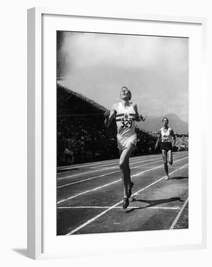 England's Dr. Roger Bannister Beating Australia's Mile Record Holder John Landy-Ralph Morse-Framed Premium Photographic Print