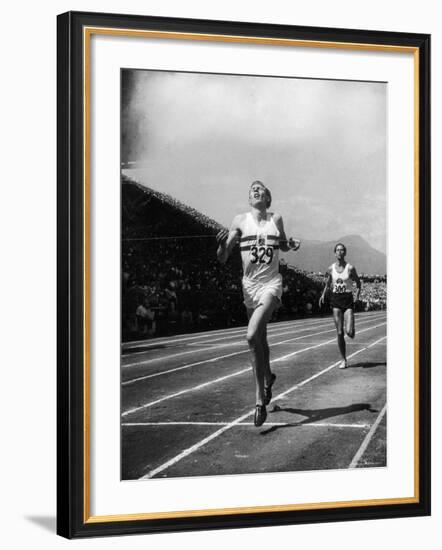 England's Dr. Roger Bannister Beating Australia's Mile Record Holder John Landy-Ralph Morse-Framed Premium Photographic Print