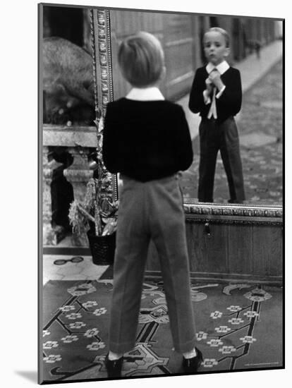 English Boy Using Reflection in Mirror in Foyer of Grand Hotel to Fix His Tie-Alfred Eisenstaedt-Mounted Photographic Print